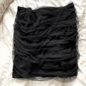 Boohoo ruched black mini skirt. Cute for a night out!